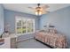 Light and airy bedroom with a twin bed and desk at 11447 Sw 69Th Cir, Ocala, FL 34476