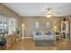 Spacious living area with hardwood floors, large windows, and ample natural light at 11447 Sw 69Th Cir, Ocala, FL 34476