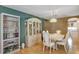 Elegant dining room with a large table and hutch at 11447 Sw 69Th Cir, Ocala, FL 34476