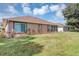 Single-story home with a large backyard, providing ample outdoor space at 11447 Sw 69Th Cir, Ocala, FL 34476