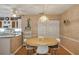 Dining area with table and chairs near kitchen at 11447 Sw 69Th Cir, Ocala, FL 34476