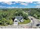 Aerial view showcasing the home's curb appeal and surrounding neighborhood at 155 Pearl St, Auburndale, FL 33823