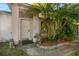 Front entrance with landscaping, featuring a walkway and garden at 1618 Montecito Ave, Deltona, FL 32738