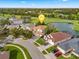 Aerial view of two-story house with pool and golf course views at 162 Harwood Cir, Kissimmee, FL 34744