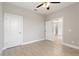 Bright bedroom with ceiling fan and tile floors at 1877 Snapper Dr, Kissimmee, FL 34759