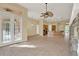 Living area with tile floors and access to patio at 2108 Drive Way, Kissimmee, FL 34746