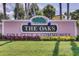 The Oaks Golf Club & Community entrance sign at 2108 Drive Way, Kissimmee, FL 34746