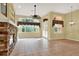 Living room with fireplace, tile floors and lots of light at 2108 Drive Way, Kissimmee, FL 34746