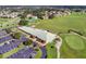 Aerial view of golf course clubhouse and parking lot at 2108 Drive Way, Kissimmee, FL 34746