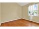 Bright bedroom with wood flooring and window at 2108 Drive Way, Kissimmee, FL 34746