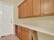 Kitchen features ample wood cabinets and counter space at 2108 Drive Way, Kissimmee, FL 34746