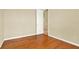 Spacious bedroom with hardwood floors and an open door at 2108 Drive Way, Kissimmee, FL 34746