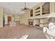 Living room with fireplace and tile flooring, open to kitchen at 2108 Drive Way, Kissimmee, FL 34746