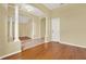Elegant foyer with hardwood and tile floors, and arched doorways at 2108 Drive Way, Kissimmee, FL 34746