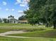 Homes overlook a lush green golf course at 21523 Queen Anne Ct, Leesburg, FL 34748