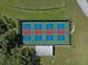 Four well-maintained pickleball courts at 21523 Queen Anne Ct, Leesburg, FL 34748