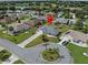 Aerial view showcasing the property's location in a residential community at 21523 Queen Anne Ct, Leesburg, FL 34748