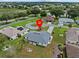 Aerial view of the property and its surrounding area at 21523 Queen Anne Ct, Leesburg, FL 34748