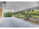Spacious screened porch overlooking backyard at 2900 Lake Arnold Pl, Orlando, FL 32806