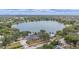 Aerial view of home near lake with surrounding neighborhood at 2900 Lake Arnold Pl, Orlando, FL 32806