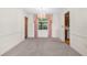 Bright dining room with window and access to kitchen at 2900 Lake Arnold Pl, Orlando, FL 32806