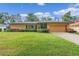 Single-story house with a spacious yard at 2900 Lake Arnold Pl, Orlando, FL 32806
