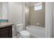 Single vanity bathroom with a tub and shower at 365 Southfield St, Kissimmee, FL 34747