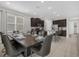 Bright dining area with large table and seating for eight at 365 Southfield St, Kissimmee, FL 34747
