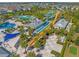 Aerial view of vibrant rainbow water slides at a water park at 365 Southfield St, Kissimmee, FL 34747