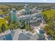 Aerial view of a two-story community center with balconies and outdoor seating at 365 Southfield St, Kissimmee, FL 34747