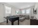 Game room with sectional sofa and foosball table at 365 Southfield St, Kissimmee, FL 34747