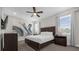 Main bedroom with a king-size bed and TV at 365 Southfield St, Kissimmee, FL 34747