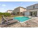 Relaxing pool and spa with lounge chairs at 365 Southfield St, Kissimmee, FL 34747