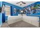 Twin bedroom with Marvel theme and built in drawers at 365 Southfield St, Kissimmee, FL 34747