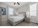 Bedroom with a queen bed and large windows at 365 Southfield St, Kissimmee, FL 34747