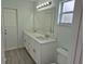 Double vanity bathroom with a modern design at 4612 Cheyenne Point Trl, Kissimmee, FL 34746