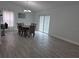 Dining room with a round table, chairs, and sliding glass doors to the patio at 4612 Cheyenne Point Trl, Kissimmee, FL 34746