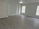 Large bedroom with wood-look floors and two closets at 4612 Cheyenne Point Trl, Kissimmee, FL 34746