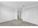 Spacious bedroom with plush carpeting and large closet at 11209 Listening Dr, Orlando, FL 32832