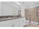 Modern bathroom with double sinks, large shower, and updated fixtures at 11209 Listening Dr, Orlando, FL 32832
