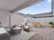 Relaxing patio with wicker furniture and brick pavers at 11209 Listening Dr, Orlando, FL 32832