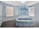 Bedroom with ice castle bed and mural at 1430 Thunderbird Rd, Davenport, FL 33896
