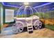 bedroom with carriage bed and mural at 1430 Thunderbird Rd, Davenport, FL 33896