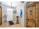 Entryway with a medieval theme and chandelier at 1430 Thunderbird Rd, Davenport, FL 33896