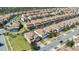 Aerial view of a large community with many houses at 1430 Thunderbird Rd, Davenport, FL 33896