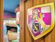 bedroom door featuring a decorative shield at 1430 Thunderbird Rd, Davenport, FL 33896