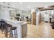 Modern kitchen with stainless steel appliances and breakfast bar at 1430 Thunderbird Rd, Davenport, FL 33896