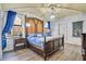 Bedroom with a large bed and unique stone wall features at 1430 Thunderbird Rd, Davenport, FL 33896