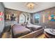 Two twin beds in a themed bedroom with medieval decor at 1430 Thunderbird Rd, Davenport, FL 33896