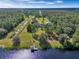 Aerial view of house with expansive lot and lake access at 20733 Oberly Pkwy, Orlando, FL 32833